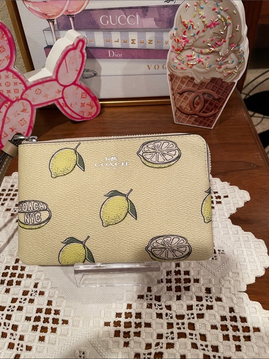 Coach Handbags - Coach Yellow Lemon Print Wristlet
